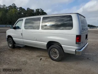2012 Ford Econoline Wagon XL with VIN 1FBNE3BL0CDA29810, listed as a Copart auction lot 79014034 with 180,514 mi miles and Salvage Title. Bid and sale history available at carsss.com. Image 2.