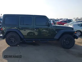 2022 Jeep Wrangler Unlimited High Tide with VIN 1C4HJXDG5NW113205, listed as a IAAI auction lot 41488724 with 30,446 mi miles and . Bid and sale history available at DreamBid. Image 14.