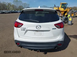 2013 Mazda CX-5 Grand Touring with VIN JM3KE4DE3D0156957, listed as a IAAI auction lot 42085443 with 146,990 mi miles. Bid and sale history available at carsss.com. Image 16.