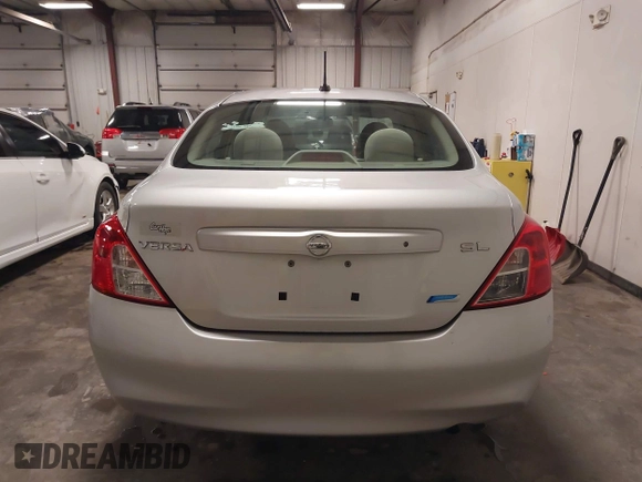 2012 Nissan Versa SV with VIN 3N1CN7AP2CL938479, listed as a IAAI auction lot 41918877 with 150,000 mi miles and . Bid and sale history available at DreamBid. Image 16.
