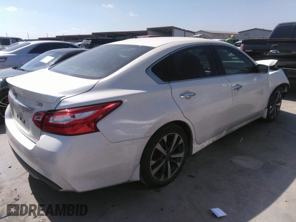 2016 Nissan Altima SR with VIN 1N4AL3AP0GC230628, listed as a IAAI auction lot 41780598 with 102,169 mi miles and . Bid and sale history available at carsss.com. Image 4.