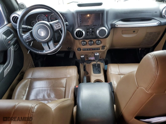 2011 Jeep Wrangler Unlimited Sahara with VIN 1J4HA5H13BL546703, listed as a Copart auction lot 51521845 with 127,132 mi miles and Salvage Title. Bid and sale history available at carsss.com. Image 8.