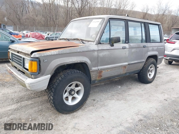 1990 Isuzu Trooper z VIN JACCH58R0L8900522, wystawiony jako IAAI lot #41642808 z przebiegiem 177 690 mil mil oraz . Historia ofert i sprzedaży dostępna na DreamBid. Obrazek 2.