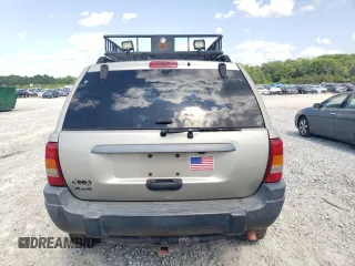 2004 Jeep Grand Cherokee Laredo z VIN 1J4GW48S84C177274, wystawiony jako Copart lot #56468855 z przebiegiem 236 014 mil mil oraz Szkoda całkowita • Salvage title. Historia ofert i sprzedaży dostępna na DreamBid. Obrazek 6.