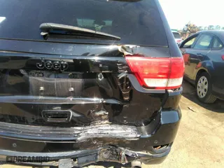 2011 Jeep Grand Cherokee Laredo with VIN 1J4RR4GG4BC558193, listed as a IAAI auction lot 40055870 with 110,939 mi miles. Bid and sale history available at carsss.com. Image 12.