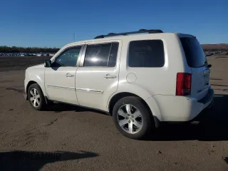2014 Honda Pilot Touring with VIN 5FNYF4H90EB045332, listed as a Copart auction lot 42993945 with 120,248 mi miles and Salvage Title. Bid and sale history available at DreamBid. Image 2.