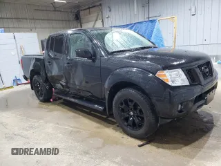 2019 Nissan Frontier SV with VIN 1N6AD0EV1KN733450, listed as a Copart auction lot 54730685 with 59,403 mi miles and Salvage title. Bid and sale history available at DreamBid. Image 4.