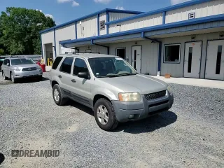 2004 Ford Escape XLT with VIN 1FMCU03134KB53192, listed as a Copart auction lot 62178075 with 223,637 mi miles and Salvage title. Bid and sale history available at DreamBid. Image 14.
