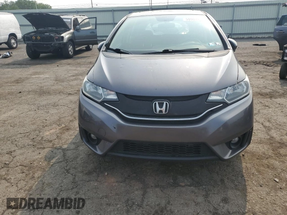 2015 Honda Fit EX-L z VIN 3HGGK5H83FM757658, wystawiony jako Copart lot #59907425 z przebiegiem 139 053 mil mil oraz Szkoda całkowita • Salvage title. Historia ofert i sprzedaży dostępna na DreamBid. Obrazek 5.