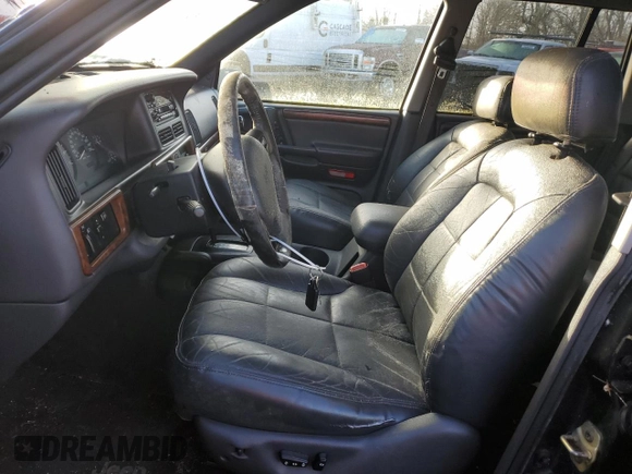 1998 Jeep Grand Cherokee Limited with VIN 1J4GZ78S0WC138917, listed as a Copart auction lot 86223974 with 152,482 mi miles and Clean title. Bid and sale history available at DreamBid. Image 7.
