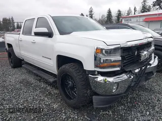 2017 Chevrolet Silverado 1500 LT with VIN 1GCUKREC1HF135337, listed as a IAAI auction lot 41267713 with 114,417 mi miles and . Bid and sale history available at DreamBid. Image 1.
