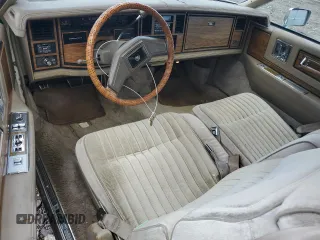 1985 Cadillac Eldorado z VIN 1G6EL578XFE673656, wystawiony jako Copart lot #86803334 z przebiegiem 94 396 mil mil oraz Tytuł czysty. Historia ofert i sprzedaży dostępna na DreamBid. Obrazek 8.