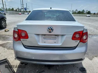2007 Volkswagen Jetta Wolfsburg Edition z VIN 3VWEF71K57M189021, wystawiony jako Copart lot #59019685 z przebiegiem 124 720 mil mil oraz Szkoda całkowita • Salvage title. Historia ofert i sprzedaży dostępna na DreamBid. Obrazek 6.