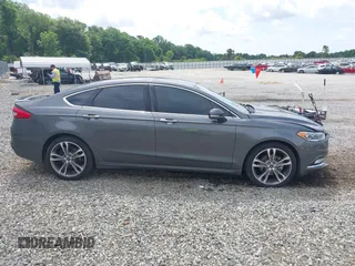 2017 Ford Fusion Titanium with VIN 3FA6P0K98HR363360, listed as a IAAI auction lot 42461432 with 182,807 mi miles and . Bid and sale history available at DreamBid. Image 13.
