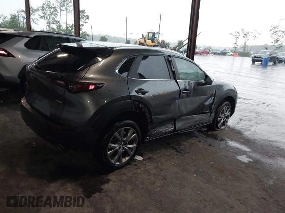 2025 Mazda CX-30 S Preferred with VIN 3MVDMBCM3SM753889, listed as a IAAI auction lot 42787411 with 21,201 mi miles and . Bid and sale history available at DreamBid. Image 4.