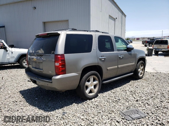 2007 Chevrolet Tahoe LT with VIN 1GNFK13027R350264, listed as a Copart auction lot 61235235 with 240,721 mi miles and Salvage title. Bid and sale history available at DreamBid. Image 3.