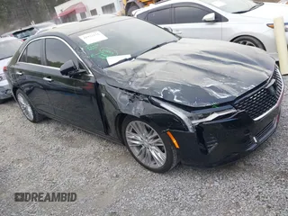 2024 Cadillac CT4 Premium Luxury z VIN 1G6DB5RK1R0125487, wystawiony jako IAAI lot #41922131 z przebiegiem 22 455 mil mil oraz . Historia ofert i sprzedaży dostępna na DreamBid. Obrazek 1.
