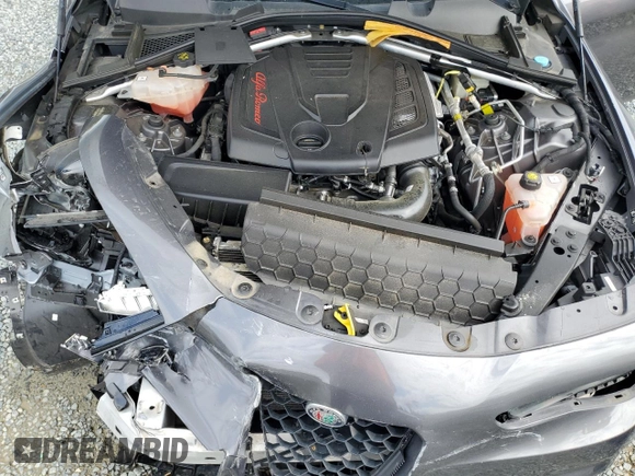 2018 Alfa Romeo Giulia Ti Sport z VIN ZARFAECN3J7576014, wystawiony jako Copart lot #52408195 z przebiegiem Nie podano mil oraz Szkody całkowita. Historia ofert i sprzedaży dostępna na DreamBid. Obrazek 12.
