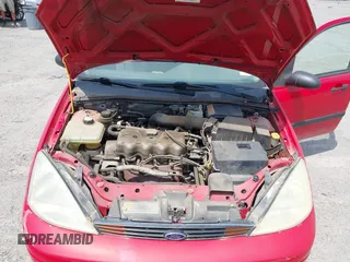 2002 Ford Focus LX with VIN 1FAFP33P32W300699, listed as a IAAI auction lot 42062916 with 108,532 mi miles and . Bid and sale history available at DreamBid. Image 10.