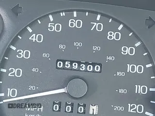 1999 Ford Escort SE with VIN 1FAFP13P6XW180845, listed as a IAAI auction lot 41398242 with 59,300 mi miles. Bid and sale history available at carsss.com. Image 15.