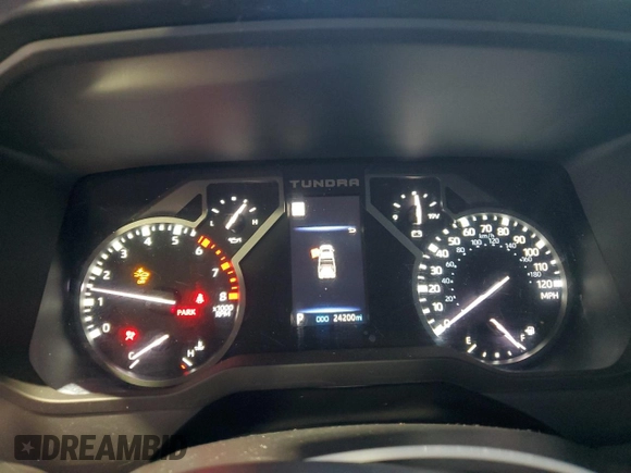 2023 Toyota Tundra SR z VIN 5TFKB5DB8PX113093, wystawiony jako Copart lot #80488324 z przebiegiem 24 200 mil mil oraz Szkoda całkowita • Salvage title. Historia ofert i sprzedaży dostępna na DreamBid. Obrazek 9.