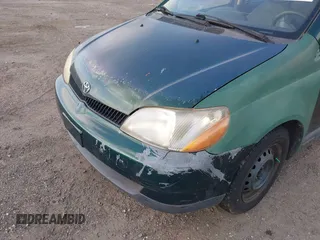 2000 Toyota ECHO z VIN JTDBT1234Y0008904, wystawiony jako IAAI lot #41998668 z przebiegiem 296 735 mil mil oraz . Historia ofert i sprzedaży dostępna na DreamBid. Obrazek 6.