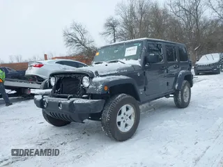 2016 Jeep Wrangler Unlimited Rubicon with VIN 1C4BJWFG7GL192698, listed as a IAAI auction lot 41603236 with 69,620 mi miles. Bid and sale history available at carsss.com. Image 2.