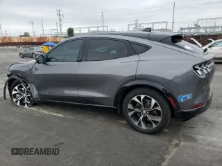 2021 Ford Mustang Mach-E Premium z VIN 3FMTK3SUXMMA09053, wystawiony jako Copart lot #48851195 z przebiegiem 89 767 mil mil oraz Szkody całkowita. Historia ofert i sprzedaży dostępna na DreamBid. Obrazek 2.