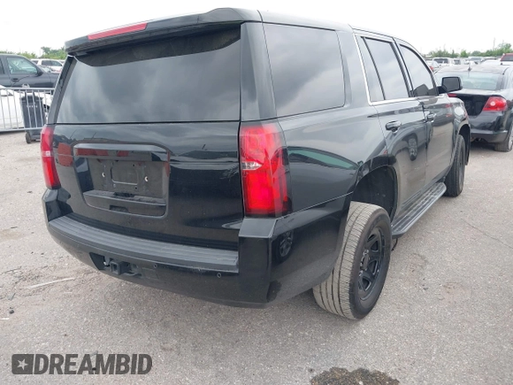 2018 Chevrolet Tahoe Commercial z VIN 1GNLCDEC6JR204921, wystawiony jako IAAI lot #42039630 z przebiegiem 96 008 mil mil oraz . Historia ofert i sprzedaży dostępna na DreamBid. Obrazek 4.