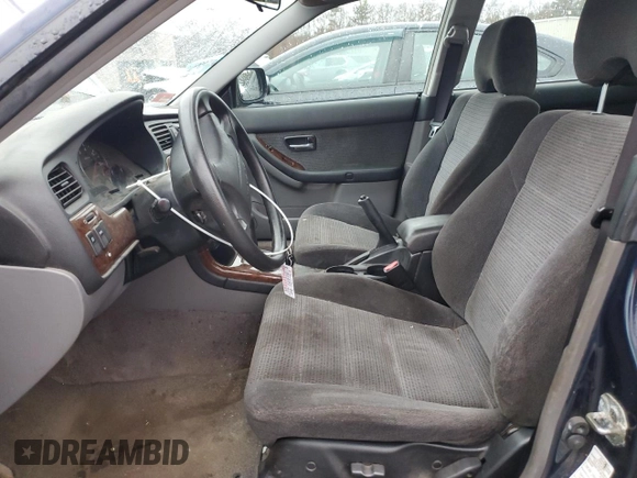 2003 Subaru Legacy Outback with VIN 4S3BH665937640565, listed as a Copart auction lot 82338234 with 82,814 mi miles and Salvage title. Bid and sale history available at DreamBid. Image 7.