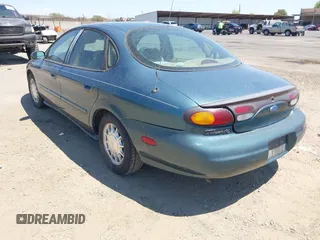 1996 Ford Taurus GL with VIN 1FALP52U3TG139417, listed as a IAAI auction lot 42760633 with 239,490 mi miles and . Bid and sale history available at DreamBid. Image 3.