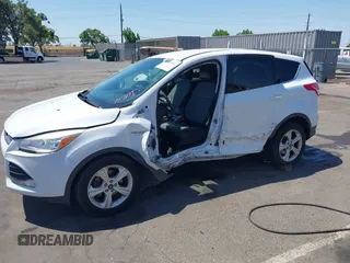 2015 Ford Escape SE z VIN 1FMCU0GX9FUA62790, wystawiony jako IAAI lot #42475851 z przebiegiem 135 697 mil mil oraz . Historia ofert i sprzedaży dostępna na DreamBid. Obrazek 6.