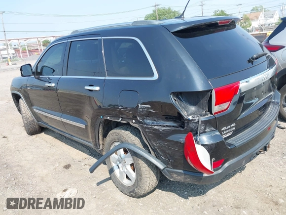 2011 Jeep Grand Cherokee Laredo with VIN 1J4RR4GG1BC534787, listed as a IAAI auction lot 42486840 with 186,229 mi miles and . Bid and sale history available at DreamBid. Image 3.