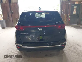 2021 Kia Sportage EX z VIN KNDPNCAC5M7886551, wystawiony jako IAAI lot #42645206 z przebiegiem 49 312 mil mil oraz . Historia ofert i sprzedaży dostępna na DreamBid. Obrazek 16.