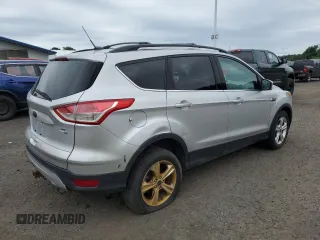 2013 Ford Escape SE z VIN 1FMCU9G9XDUC40645, wystawiony jako Copart lot #62681275 z przebiegiem 117 744 mil mil oraz Czysty tytuł • Clean title. Historia ofert i sprzedaży dostępna na DreamBid. Obrazek 3.