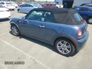 2011 MINI Convertible z VIN WMWZN3C56BTZ78387, wystawiony jako Copart lot #65002185 z przebiegiem 147 901 mil mil oraz Czysty tytuł • Clean title. Historia ofert i sprzedaży dostępna na DreamBid. Obrazek 2.