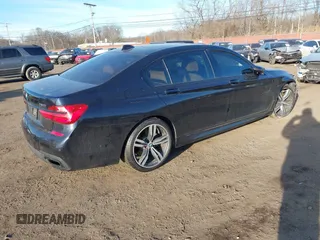2017 BMW 7 Series 750i with VIN WBA7F0C34HGM21805, listed as a IAAI auction lot 41446797 with 88,753 mi miles and . Bid and sale history available at DreamBid. Image 4.