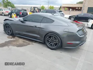 2020 Ford Mustang EcoBoost with VIN 1FA6P8TH6L5182192, listed as a IAAI auction lot 42129608 with 75,281 mi miles and . Bid and sale history available at DreamBid. Image 3.