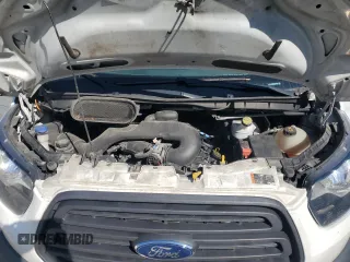 2018 Ford Transit z VIN 1FTYR2CM1JKB39451, wystawiony jako Copart lot #70852124 z przebiegiem 230 942 mil mil oraz Tytuł czysty. Historia ofert i sprzedaży dostępna na DreamBid. Obrazek 11.