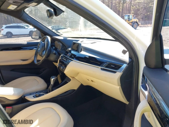 2017 BMW X1 xDrive28i with VIN WBXHT3C37H5F69725, listed as a IAAI auction lot 41588095 with 109,704 mi miles. Bid and sale history available at carsss.com. Image 5.