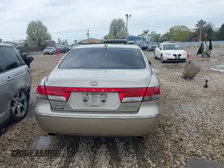 2009 Hyundai Azera Limited z VIN KMHFC46FX9A343230, wystawiony jako IAAI lot #42107823 z przebiegiem 26 319 mil mil oraz . Historia ofert i sprzedaży dostępna na DreamBid. Obrazek 17.