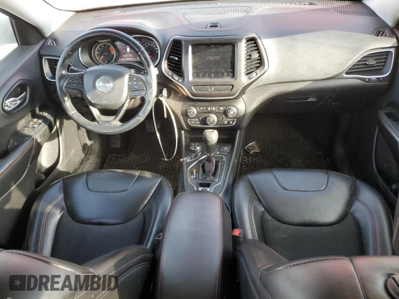 2019 Jeep Cherokee Trailhawk with VIN 1C4PJMBX7KD361816, listed as a Copart auction lot 46457465 with 244,301 mi miles and Salvage Title. Bid and sale history available at DreamBid. Image 8.