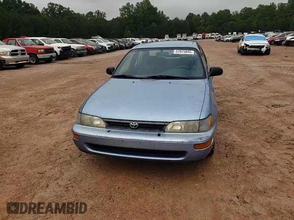 1995 Toyota Corolla DX with VIN 2T1AE09B5SC127586, listed as a Copart auction lot 57075045 with 244,969 mi miles and Salvage title. Bid and sale history available at DreamBid. Image 13.