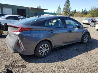 2021 Toyota Prius LE with VIN JTDKAMFP7M3185847, listed as a Copart auction lot 52897465 with 58,996 mi miles and Salvage Title. Bid and sale history available at DreamBid. Image 3.