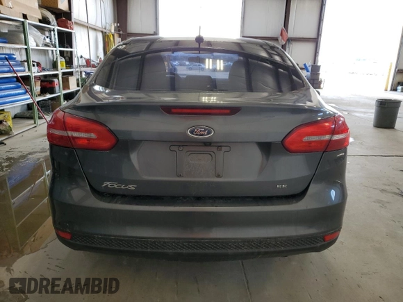 2017 Ford Focus SE with VIN 1FADP3F24HL260795, listed as a Copart auction lot 46895775 with Not provided miles and Salvage title. Bid and sale history available at DreamBid. Image 6.