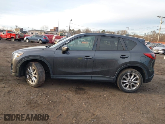 2015 Mazda CX-5 Grand Touring with VIN JM3KE4DY5F0470445, listed as a IAAI auction lot 41236468 with 87,845 mi miles. Bid and sale history available at carsss.com. Image 14.