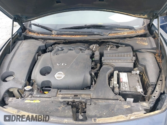 2013 Nissan Maxima S with VIN 1N4AA5APXDC803631, listed as a IAAI auction lot 42168957 with 119,845 mi miles and . Bid and sale history available at DreamBid. Image 10.
