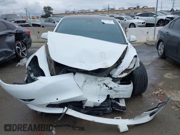 2018 Tesla Model 3 Long Range Battery with VIN 5YJ3E1EA1JF038751, listed as a IAAI auction lot 40553966 with 95,753 mi miles and . Bid and sale history available at DreamBid. Image 11.