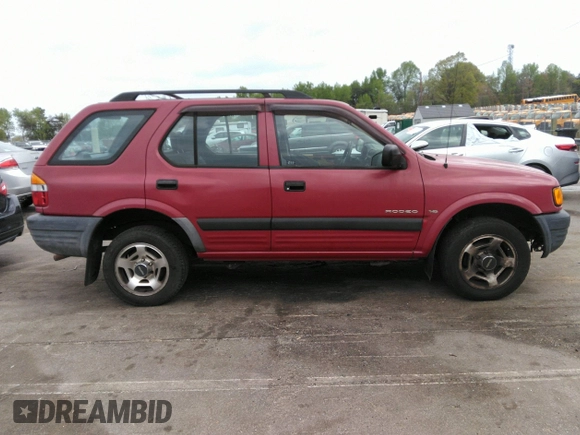 1998 Isuzu Rodeo S z VIN 4S2CK58WXW4325645, wystawiony jako IAAI lot #42013228 z przebiegiem 300 698 mil mil oraz . Historia ofert i sprzedaży dostępna na DreamBid. Obrazek 13.