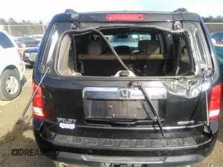 2012 Honda Pilot Touring with VIN 5FNYF3H90CB035309, listed as a IAAI auction lot 41063215 with 228,081 mi miles and . Bid and sale history available at carsss.com. Image 16.